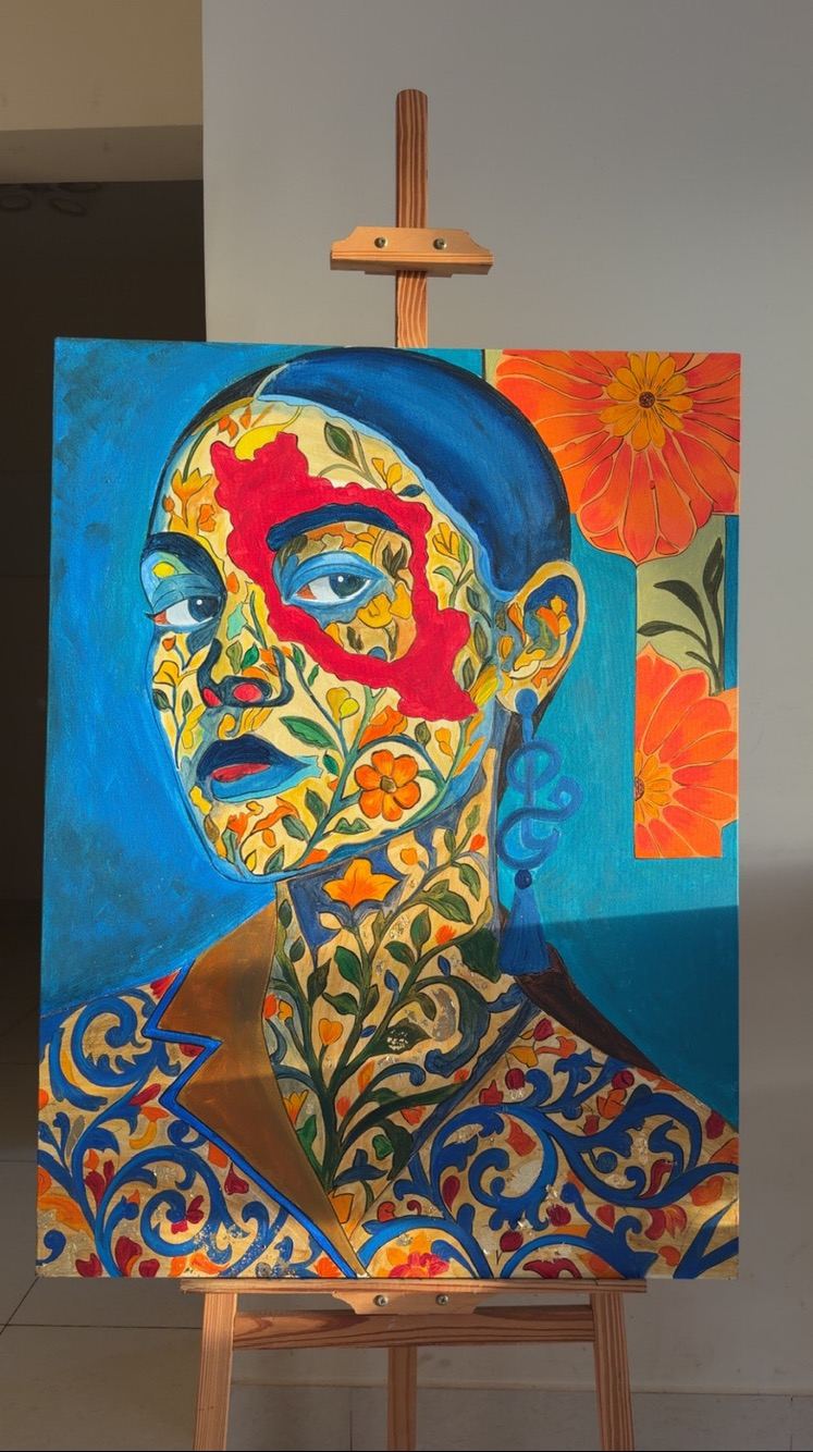The finished portrait on an easel